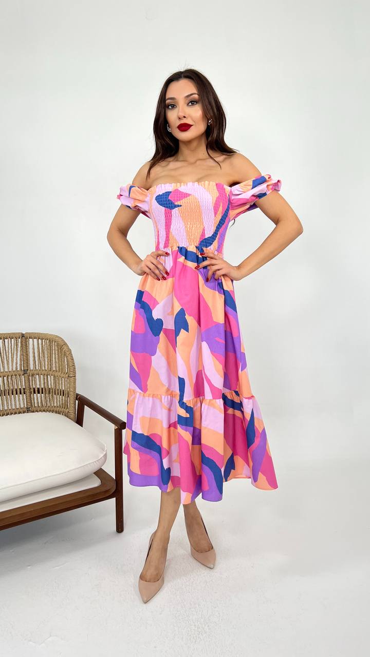 An image showcasing a Pink blue vibrant cotton summer dress with a relaxed fit and airy fabric, perfect for warm weather outings and beachside adventures