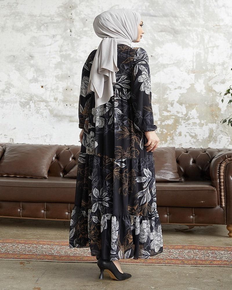 dark grey chiffon long dress, a graceful ensemble designed to captivate with its ethereal beauty and feminine allure. Crafted from delicate chiffon fabric, this dress embodies elegance and sophistication, making it a perfect choice for special occasions or formal events.