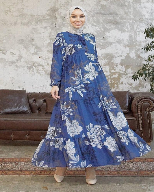 blue chiffon long dress, a graceful ensemble designed to captivate with its ethereal beauty and feminine allure. Crafted from delicate chiffon fabric, this dress embodies elegance and sophistication, making it a perfect choice for special occasions or formal events.