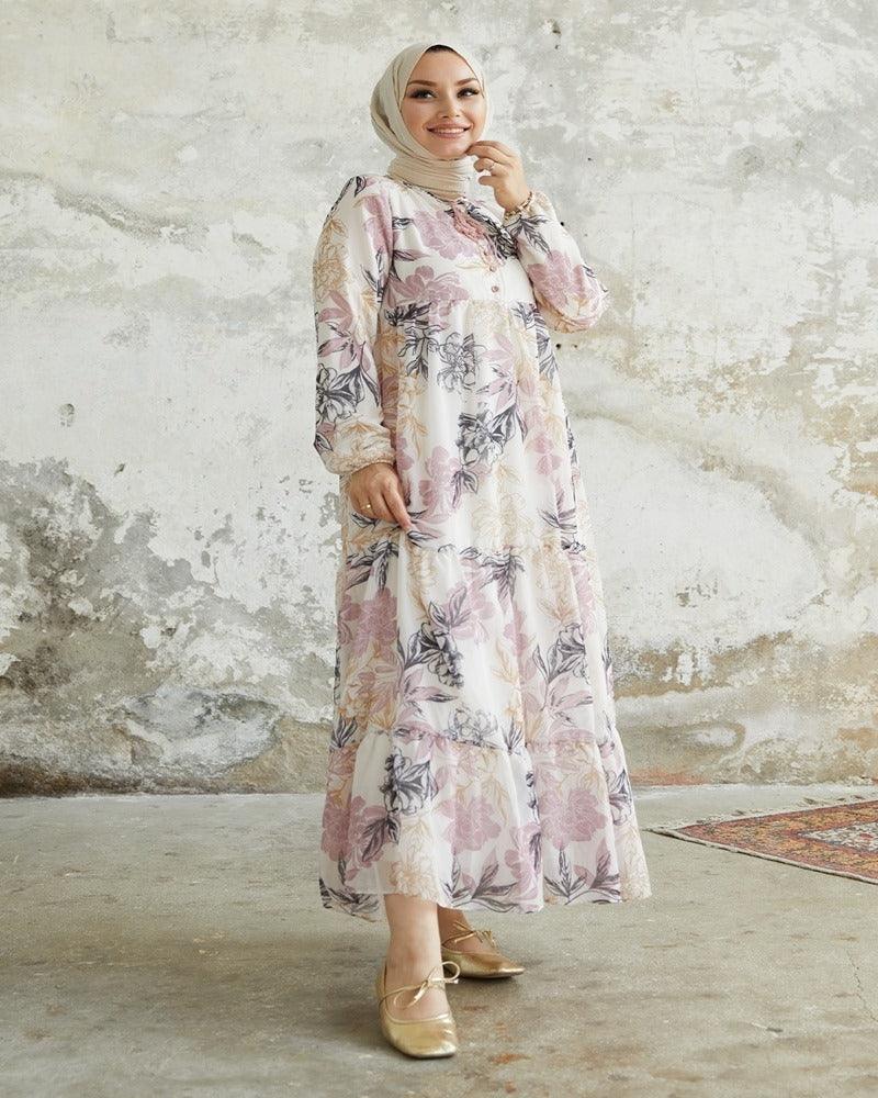 Introducing our exquisite chiffon long dress, a graceful ensemble designed to captivate with its ethereal beauty and feminine allure. Crafted from delicate chiffon fabric, this dress embodies elegance and sophistication, making it a perfect choice for special occasions or formal events.